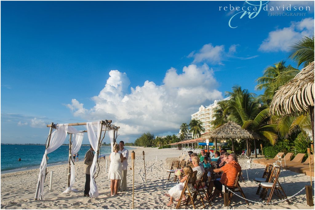 family on caribbean beach for wedding