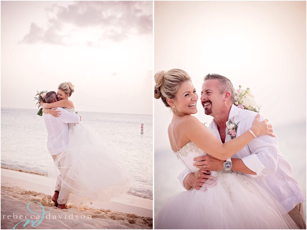 bride and groom all white hug on beach