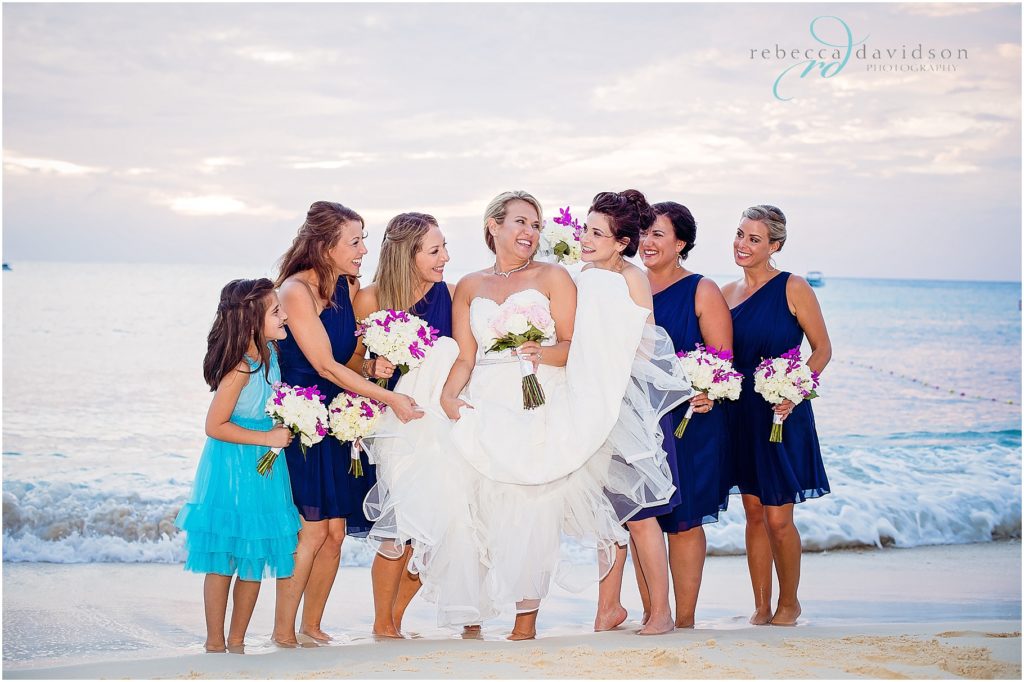 bride with bridesmaids in navy blue