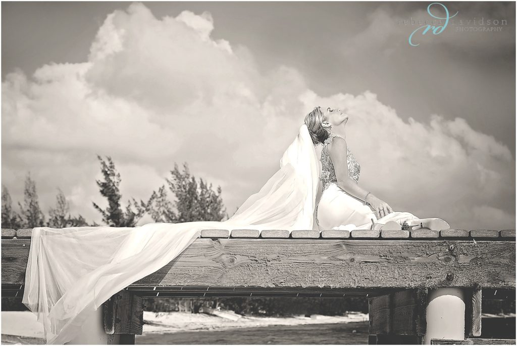 bride on pier in gorgeous gown