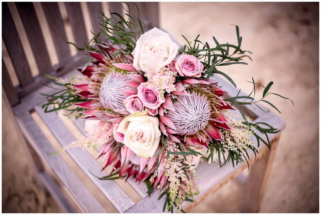 The Flower Dell; proteas, garden roses, spray roses, astilbe and greenery