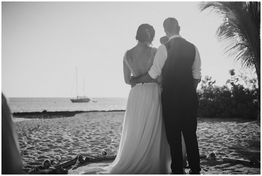 bride and groom black and white on beach