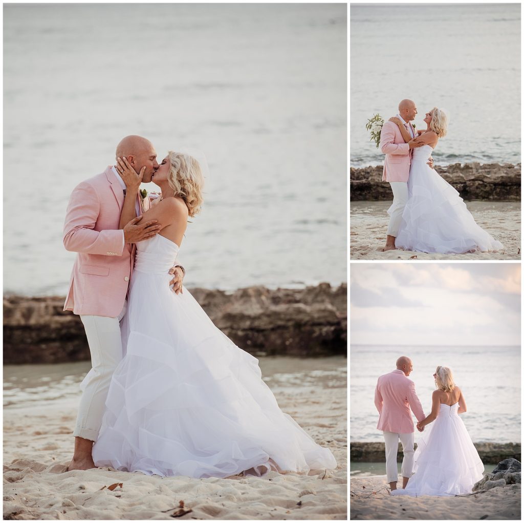 couple kissing barefoot on beach