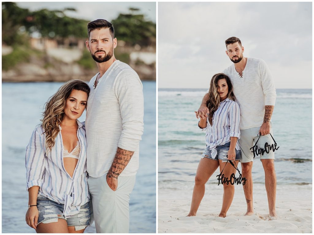 couple in ocean with signs his and hers