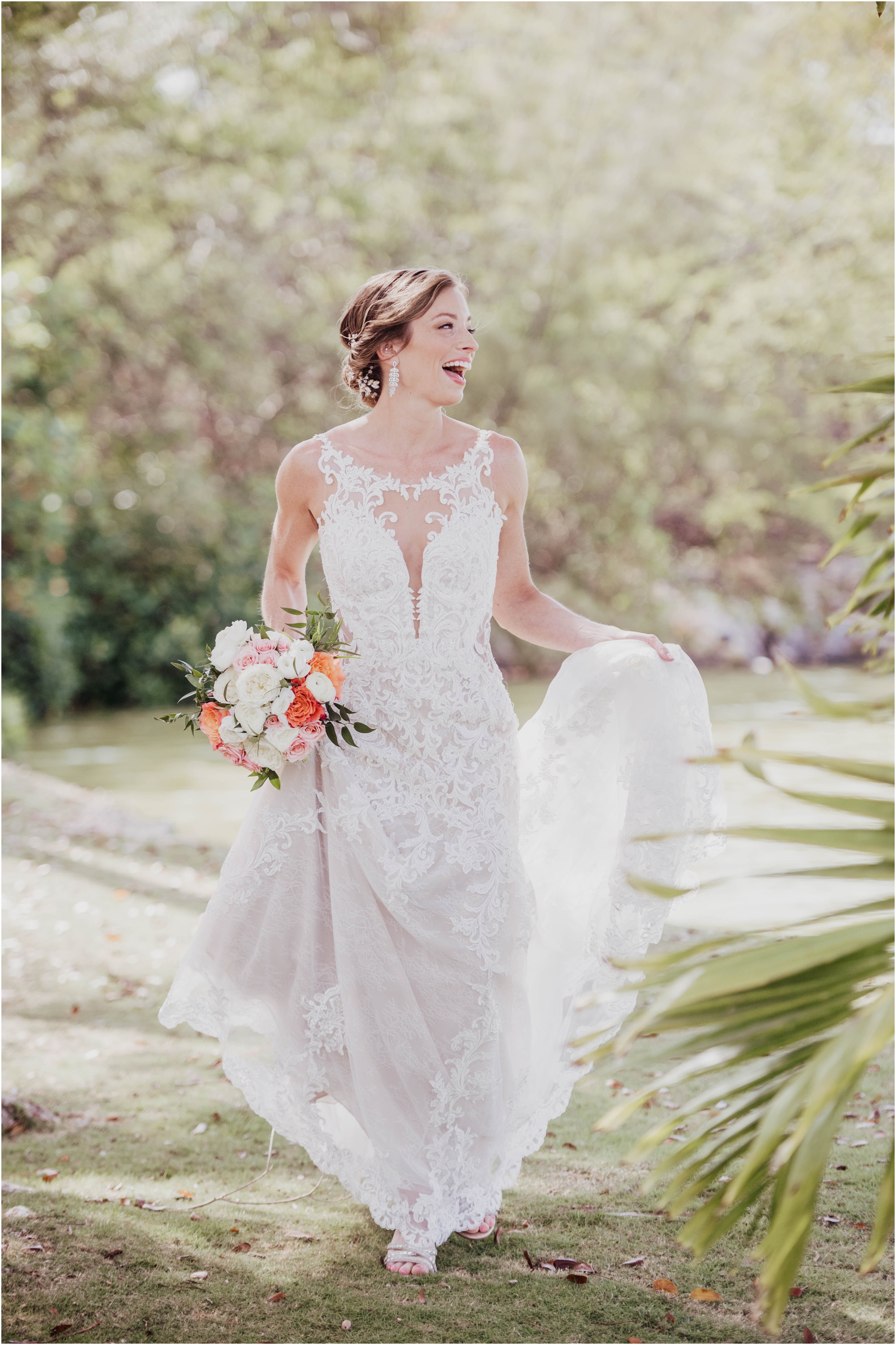 bride in garden wearing Essence of Austria gown