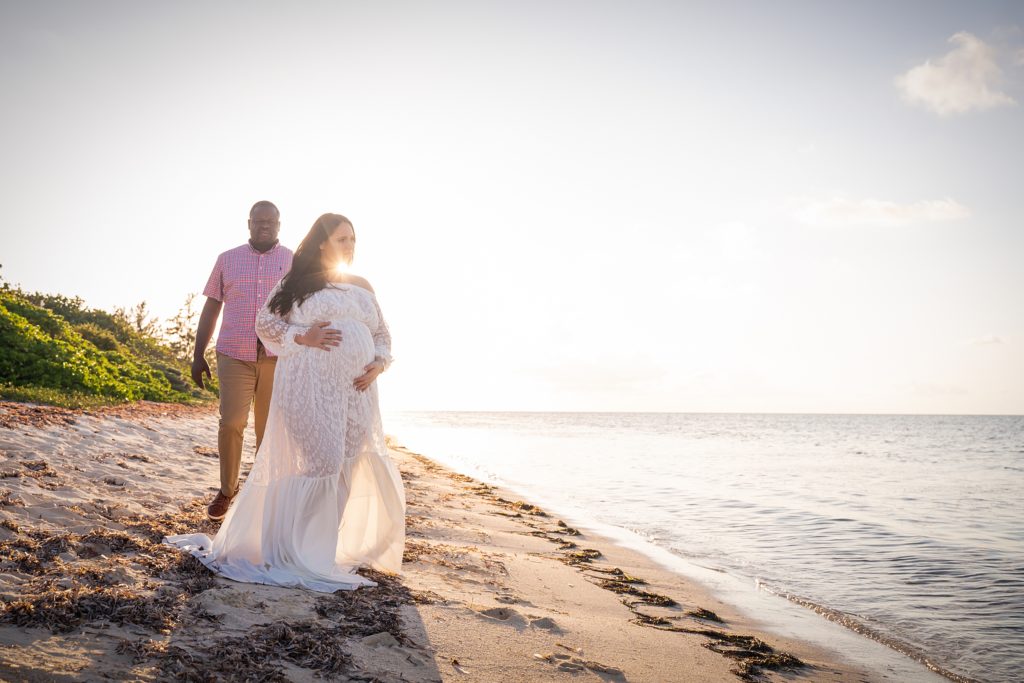 white maternity dress on beach session grand cayman